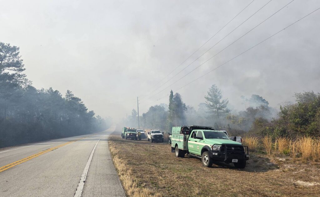 Smoke covers roadway near Ocala National Forest