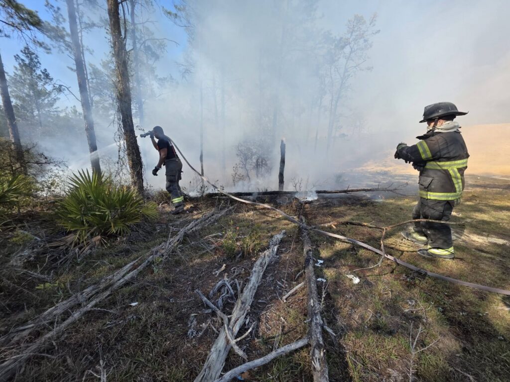 A helicopter above the forest fire on Saturday, March 21. 2