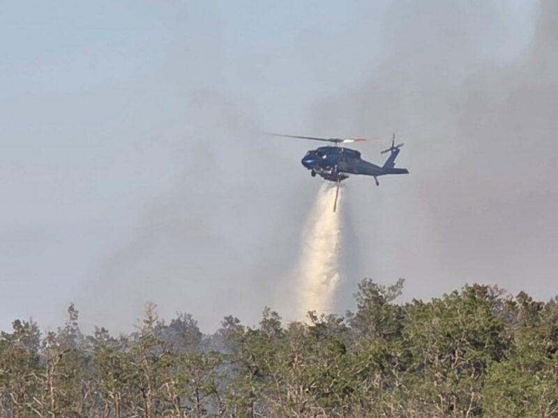A helicopter above the forest fire on Saturday, March 21. 4
