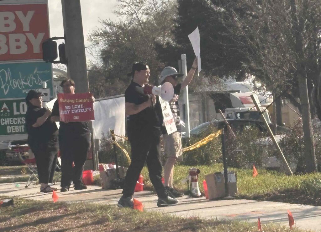 Protestors outside of Raising Cane s in Ocala on March 3