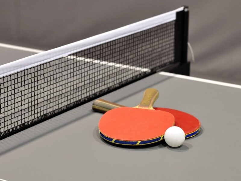 Table tennis raquets, net, and table