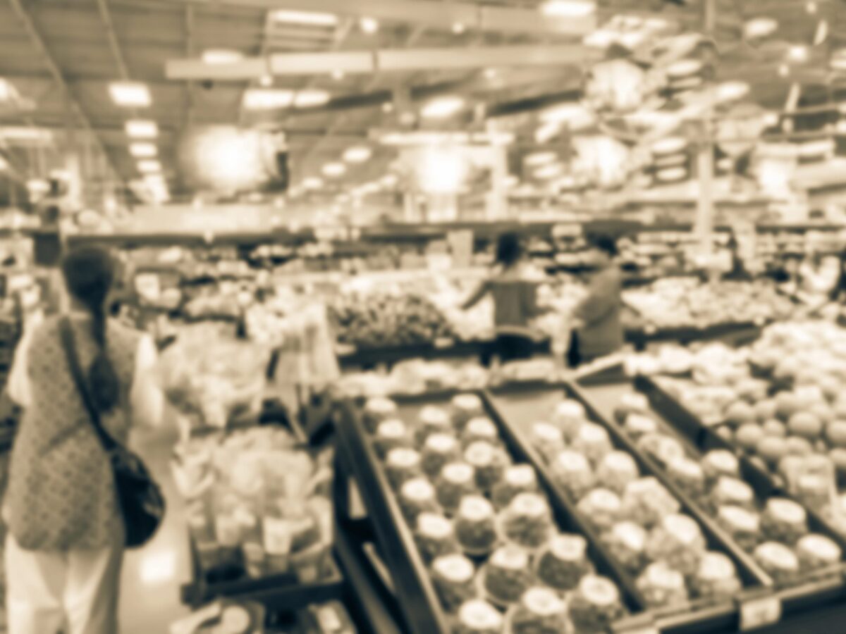 A blurred grocery store with vintage filter