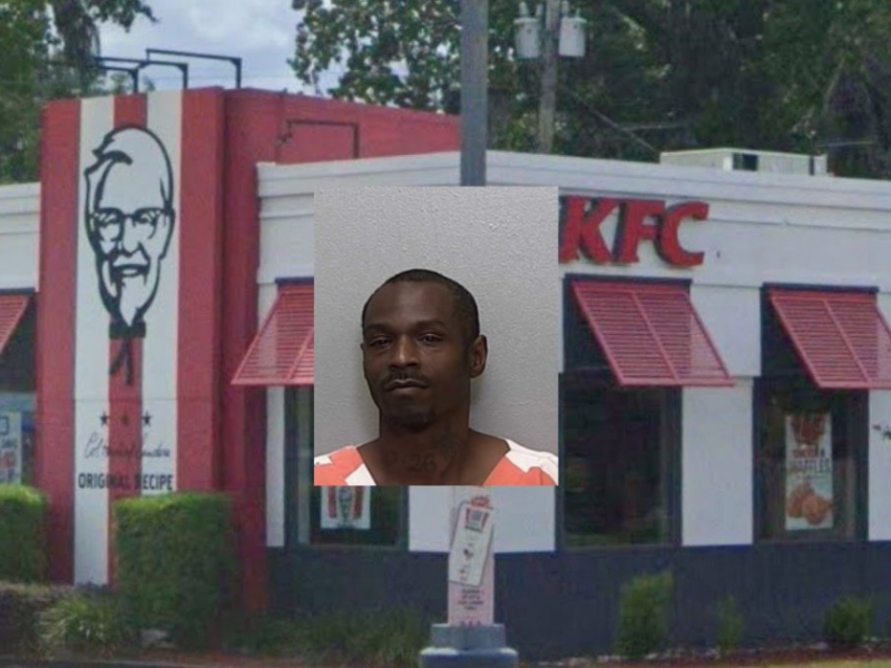 Jacob Charles Lancaster, a KFC manager in Belleview, was arrested for allegedly throwing a rock at a customer's truck. (Background photo credit: Google)