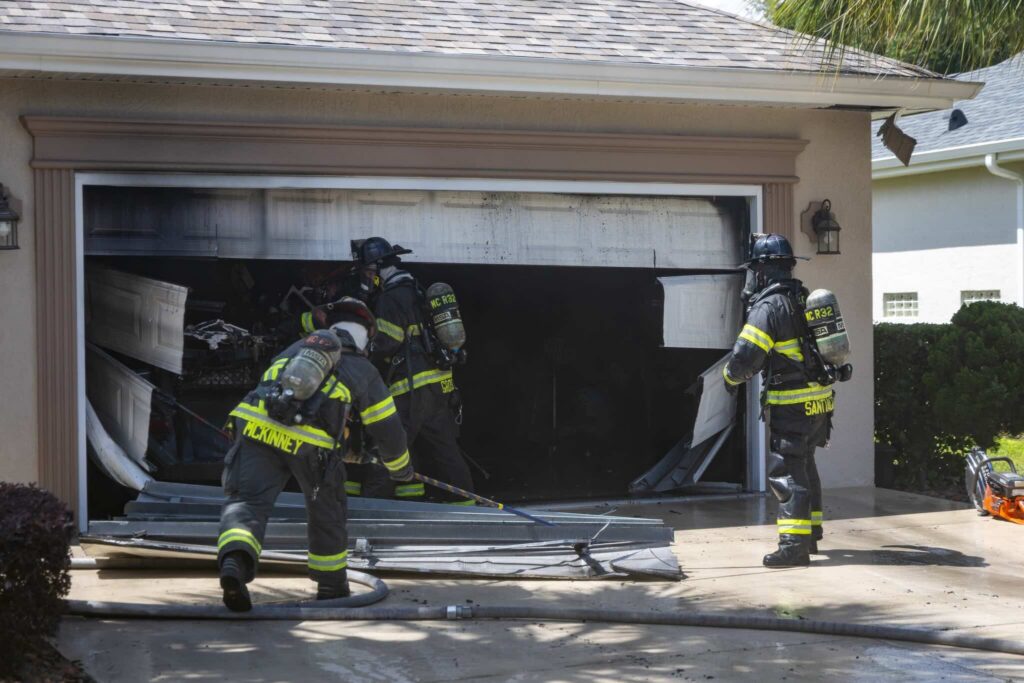 Firefighters break into garage to get to golf cart on fire