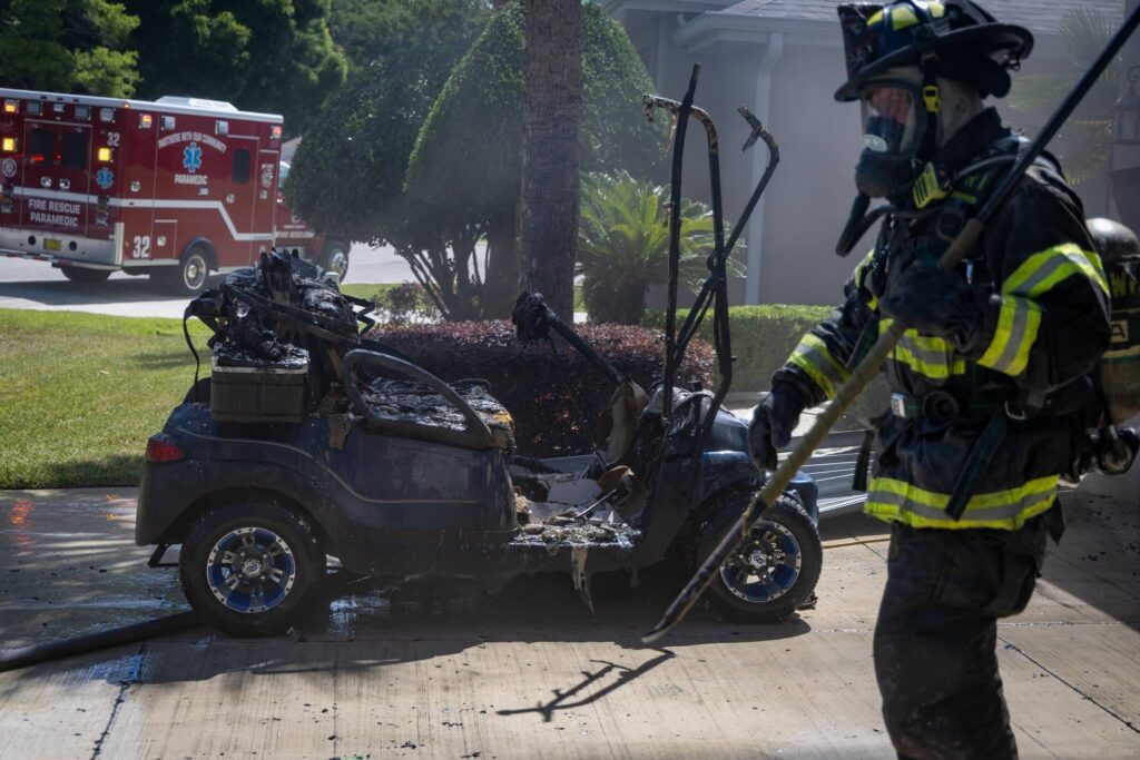 The golf cart was destroyed by flames