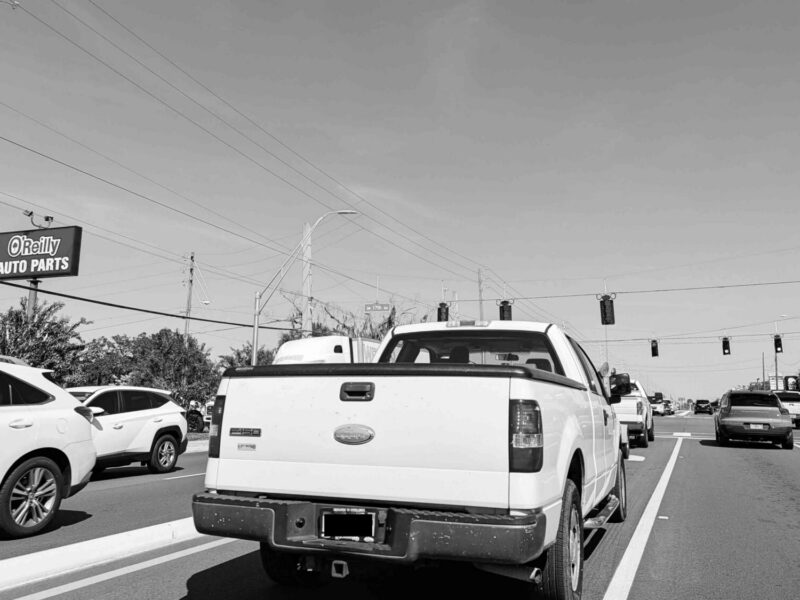 A pickup truck driving down State Road 200 in Ocala