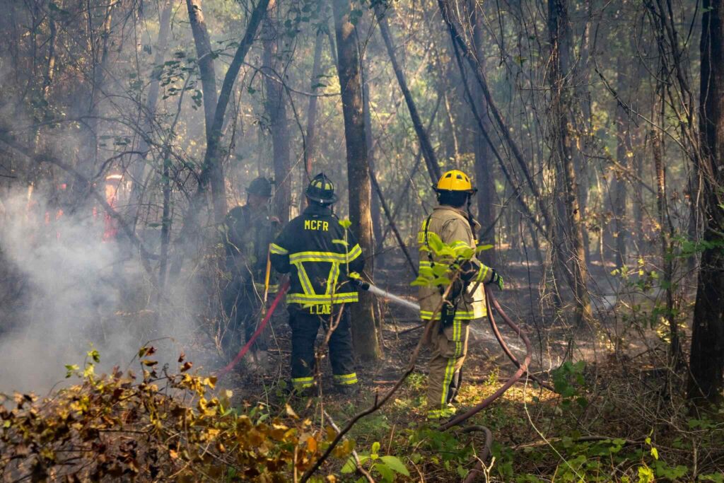 Marion County crews address fire that sparked in woods in Silver Springs