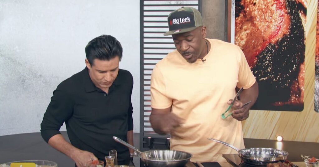 Rashad Jones right and Mario Lopez left during an appearance on Access Daily
