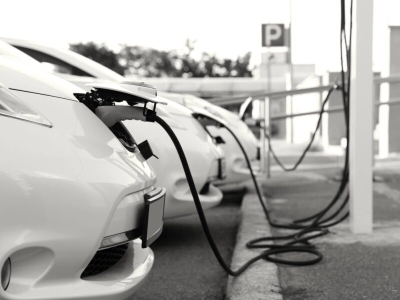 Electric cars charging at stations