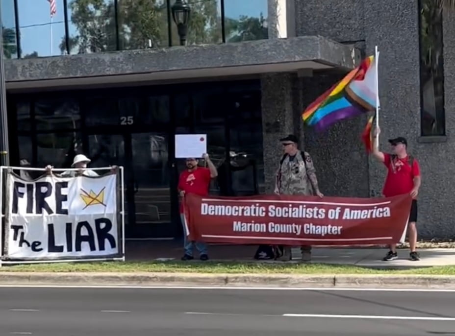 Fire the Liar sign