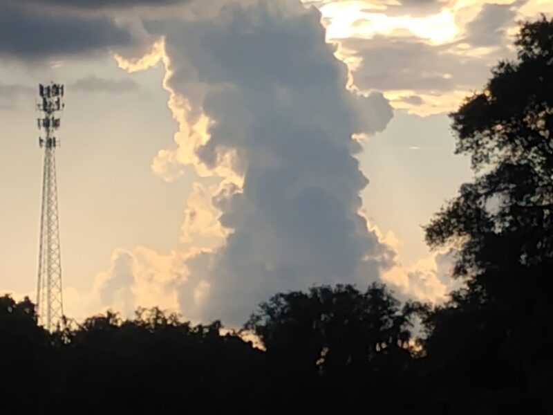 Towering cloud formation rises over the Marion County horizon