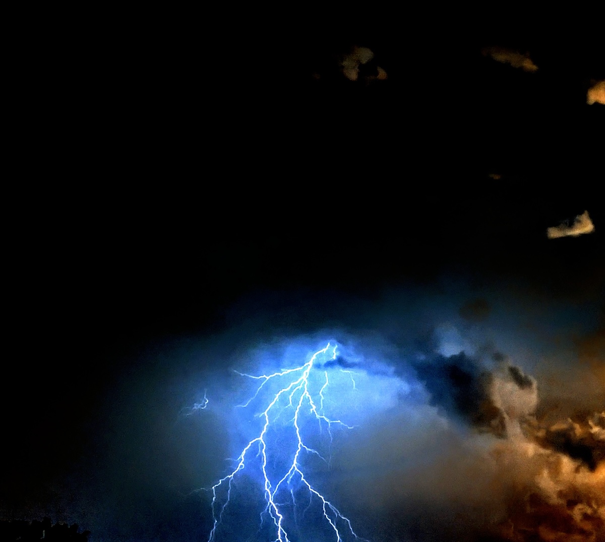 Lightning strike lights up the sky over the SummerGlen Community Lightning strike lights up the sky over the SummerGlen Community