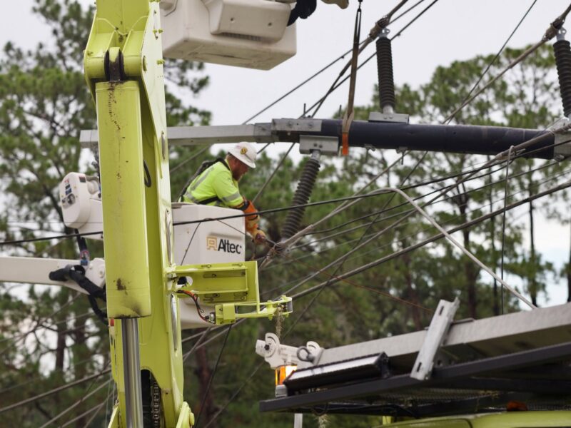 Ocala Electric Utility lineman working after a thunderstorm in Ocala on July 11, 2026.