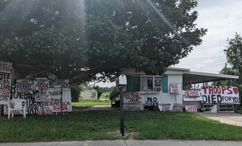 Signs outside of Anello s home in Ocala in July 2021