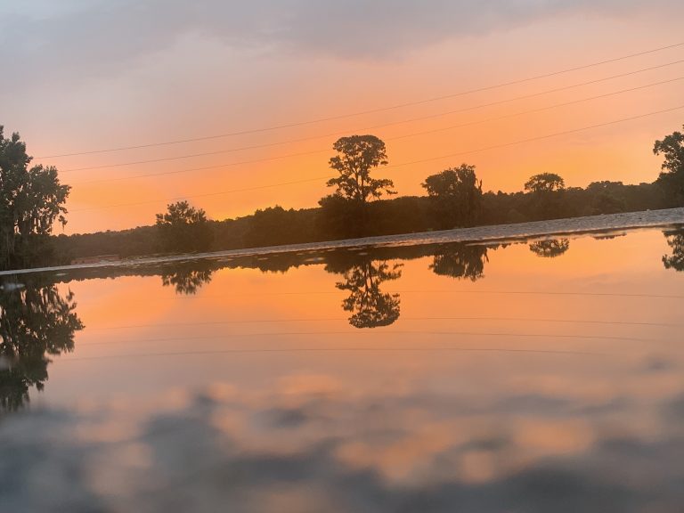 Orange sunrise over water